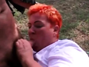 Red-haired grandmother inhales