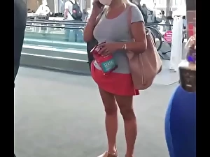 Straight from the shoulder GILF Upskirt